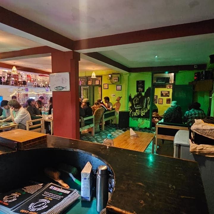 The café at night, busy with guests